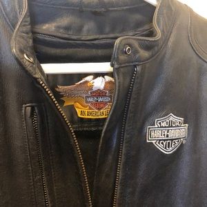 Well loved and taken care of, black ladies Harley Davidson bike jacket. Medium